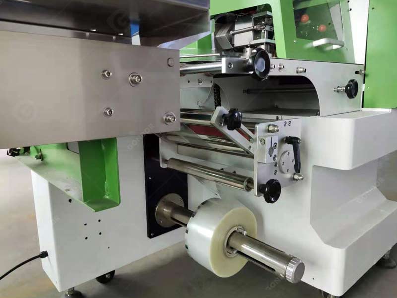chocolate wrapping machine for wrapping chocolate in foil and paper