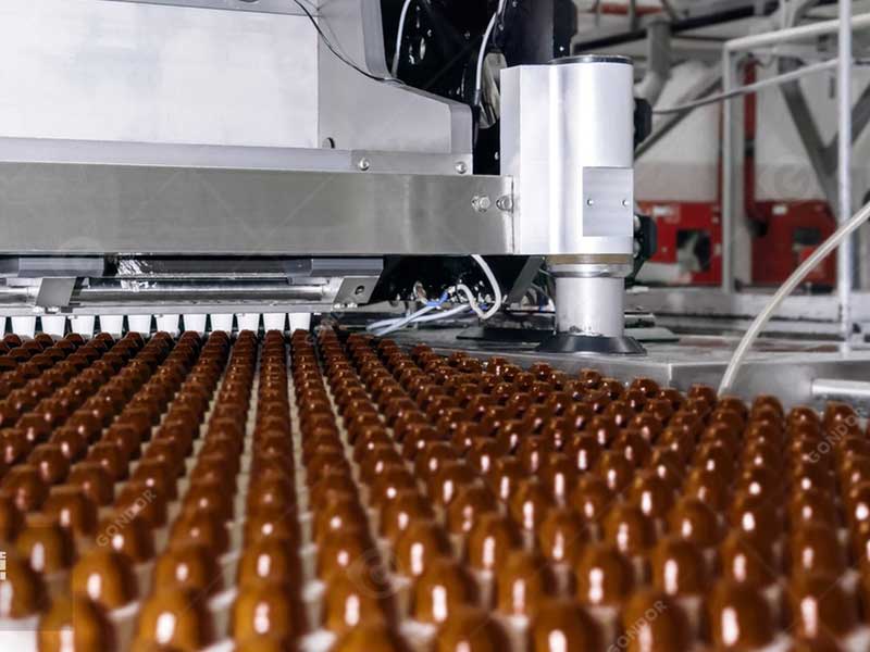 Technicians Operating Chocolate Processing Machines