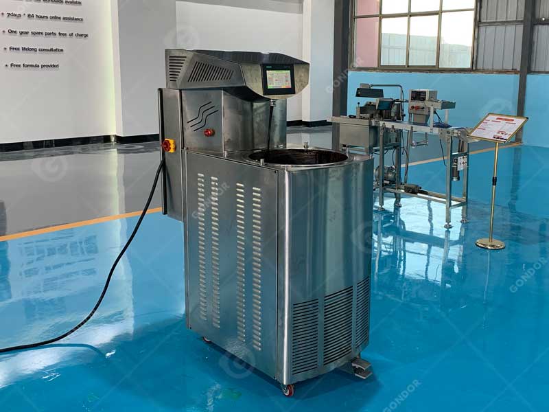 Chocolate flow from 60L tempering machine