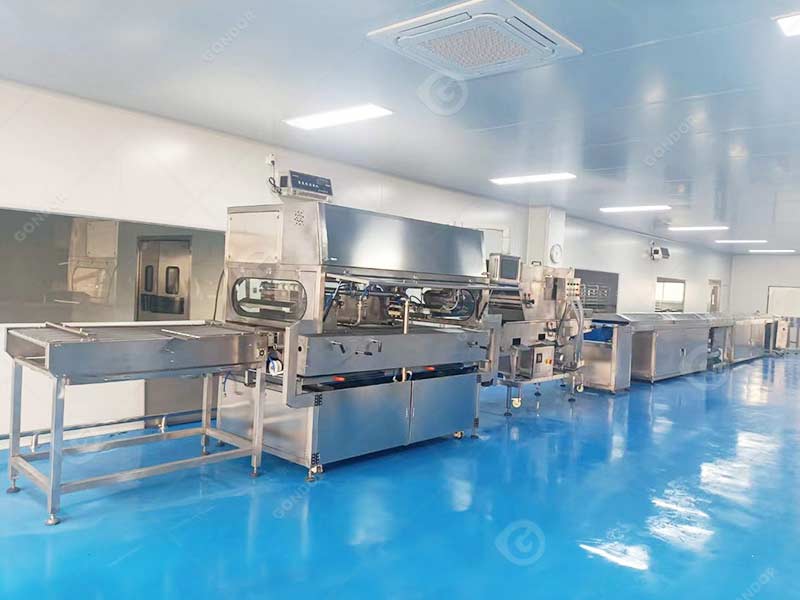 commercial chocolate enrober with adjustable coating thickness