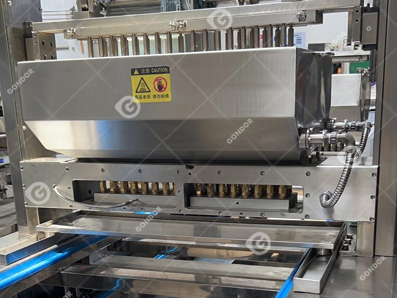 Linea di produzione di gocciolamento di cioccolato a stantuffo