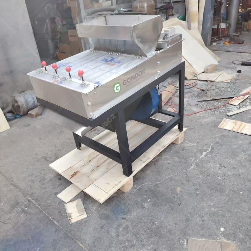 Machine à décortiquer les arachides