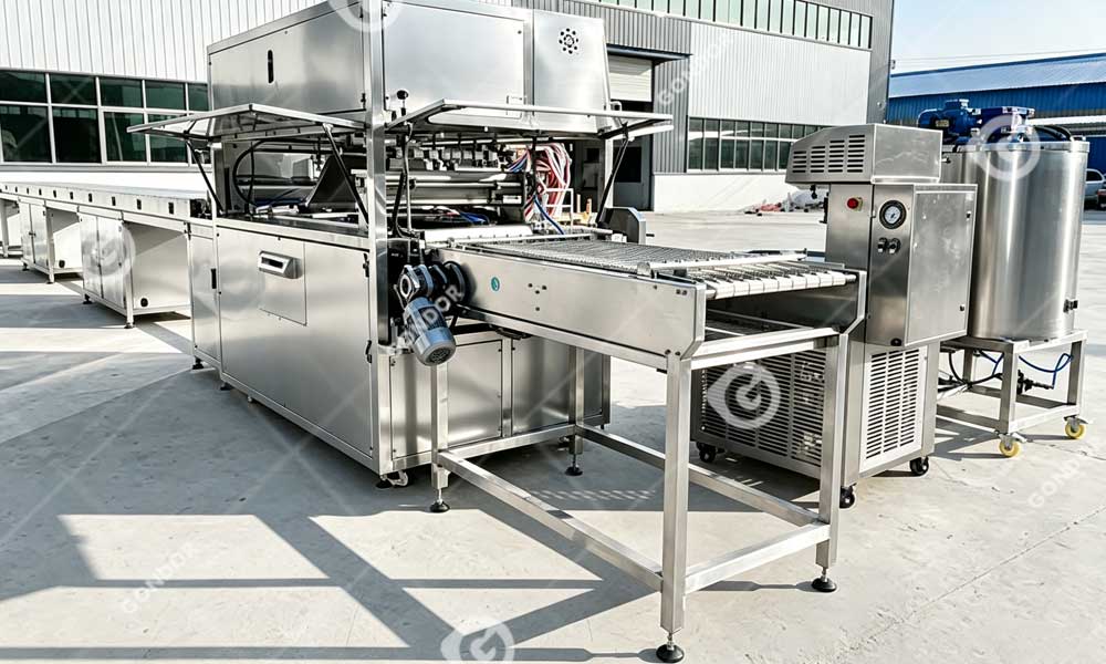 machine d'enrobage de chocolat avec table vibrante